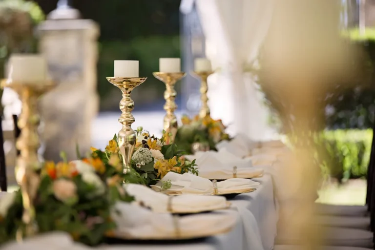 selective focus of candlesticks on table with wedding set up 1128783 768x512