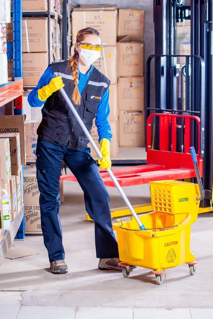 Northward Cleaning Solutions woman holding mop 209271